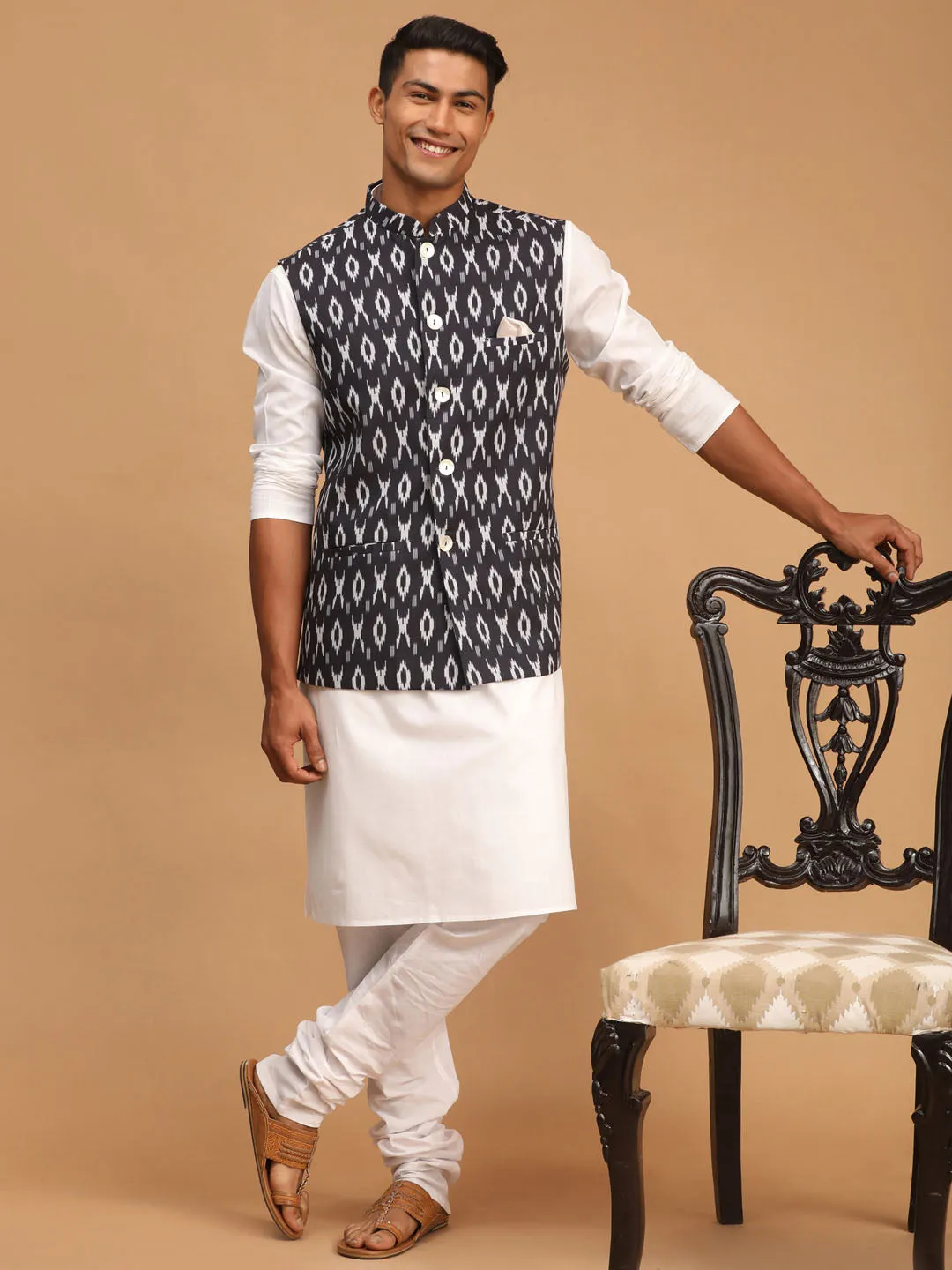 VASTRAMAY Men's Black Ikkat Printed Cotton Nehru Jacket With White Kurta And Pyjama Set